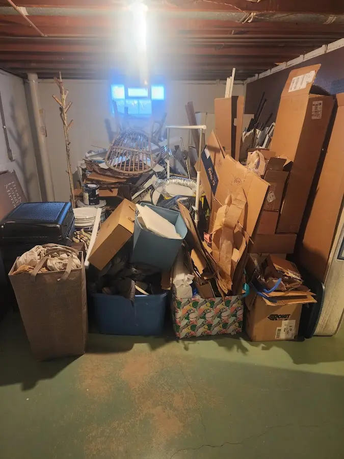 Roll-off dumpster container at job site for 15 Yard Dumpster Rental in Roselawn